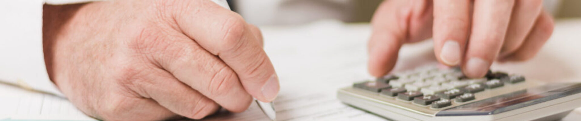 businessman-using-calculator